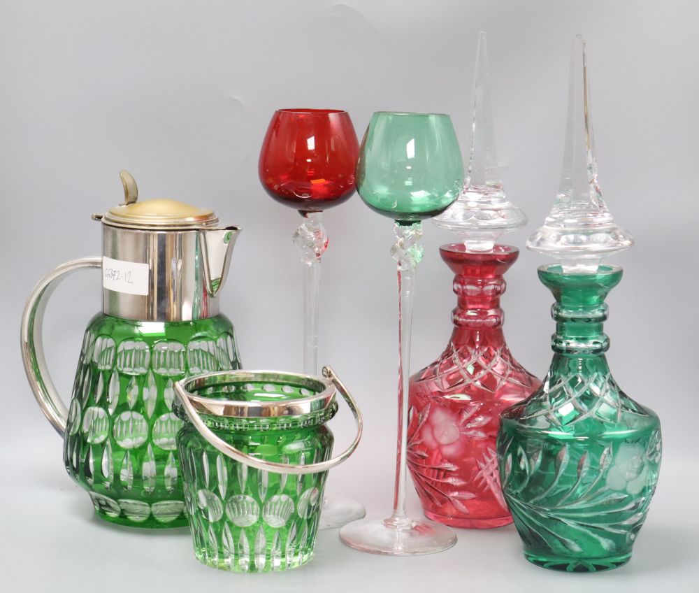 A Bohemian lemonade jug, two decanters, an ice pail and two tall stem glasses